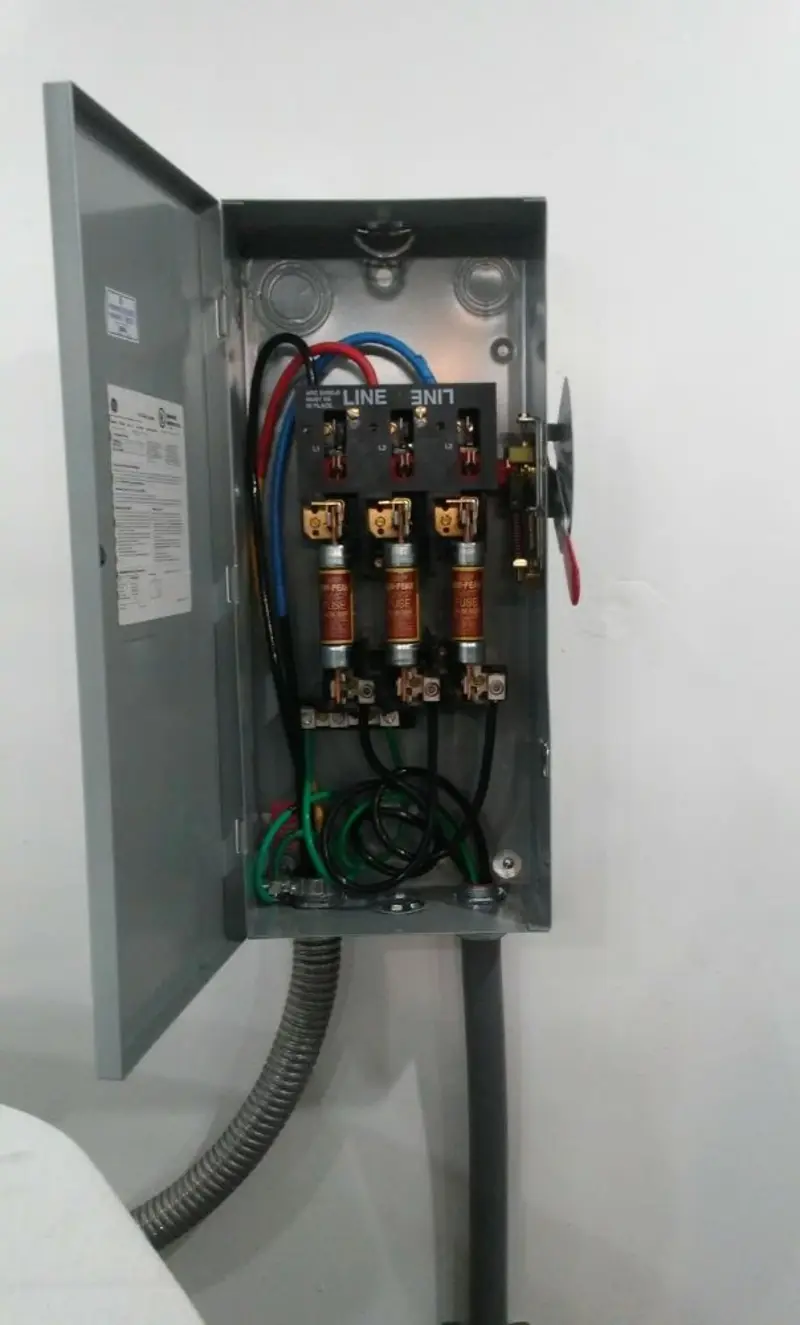 Three-phase disconnect switch installed for Smoke Detector Installation in Angier